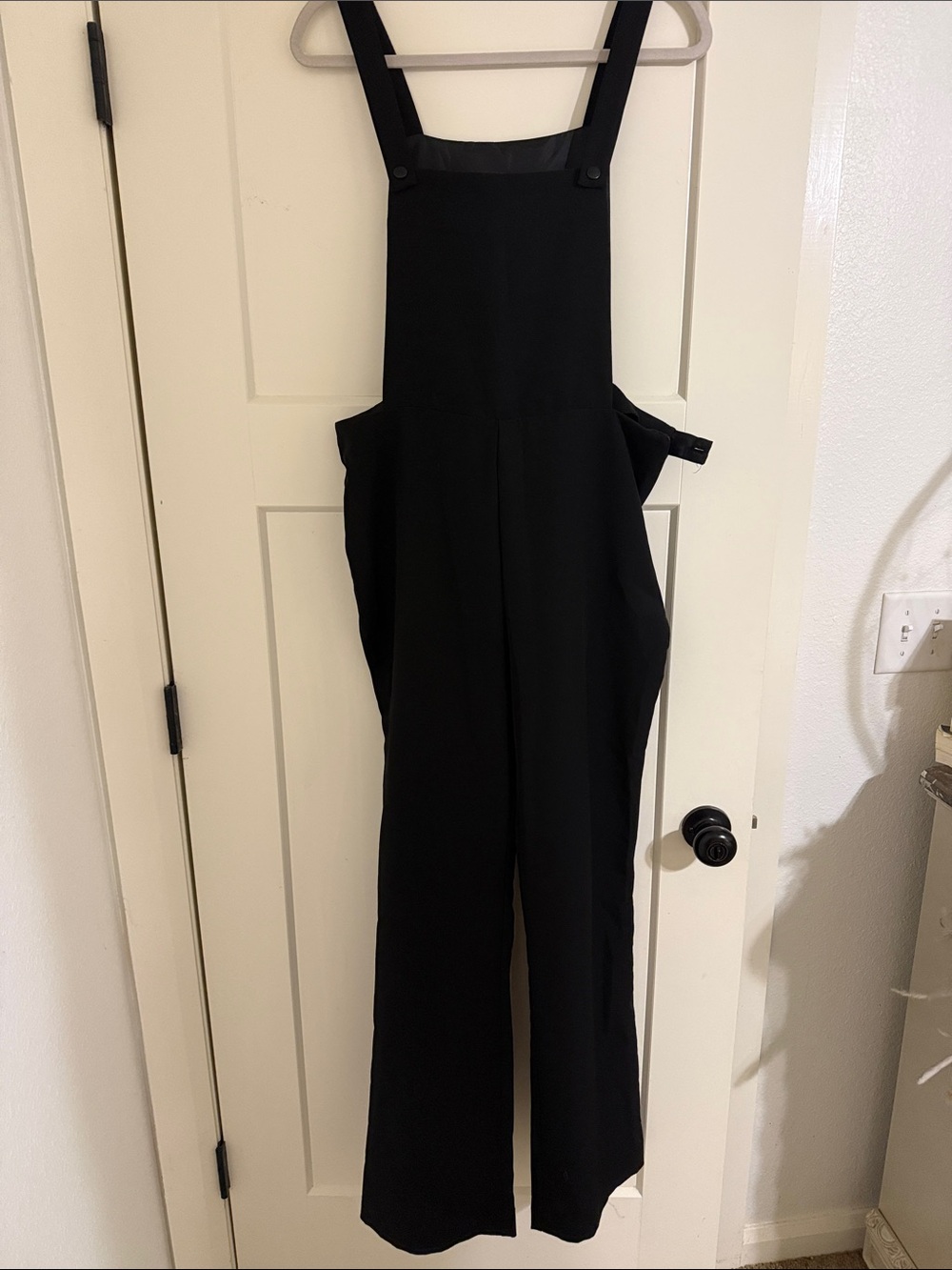 Romeo & Juliet Couture Black Bib Jumpsuit with Straight Legs